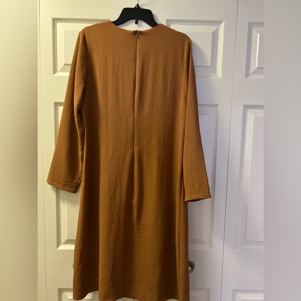 A classic long sleeve shirt in a stylish camel color.